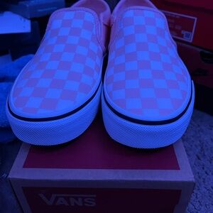 Pink and white vans.